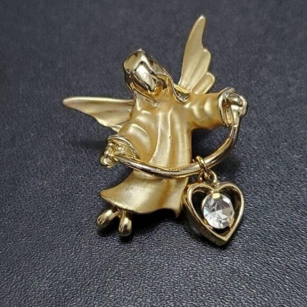 Gigi gold tone guardian angel brooch